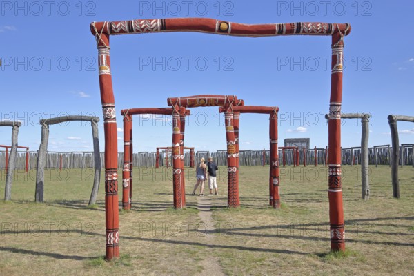 Archaeological reconstructed circular ditch from the Stone Age, Bronze Age, archway with visitors, tourist ring ditches, reconstruction, wooden beams, wooden posts, palisades, ring sanctuary, Pömmelte, Zackmünde, Barby, Saxony-Anhalt, Germany
