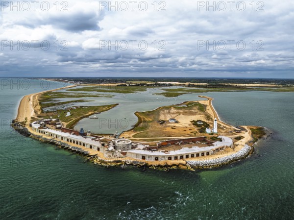 Hurst Point Lighthouse and Hurst Castle from drone over Hurst Spit, Milford on Sea, Lymington, Hampshire, England, United Kingdom
