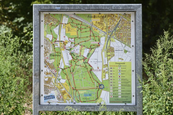 Mannheim, Germany - August 31st 2025: Information sign with map of Dossenwald forest in Mannheim