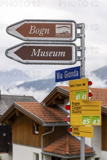 Signpost to the Bogn wellness and adventure pool and museum, Sedrun railway station, Surselva, Graubünden, Switzerland