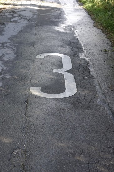 Patched asphalt, symbolic image for renovation needs, Germany