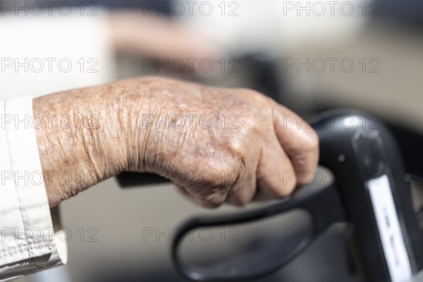 Close-up of wrinkled hands of a 90+ year old senior citizen in a retirement home, Cologne, North Rhine-Westphalia, Germany