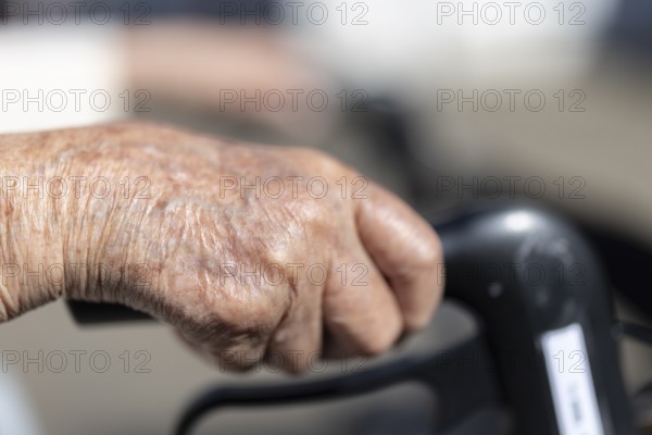 Close-up of wrinkled hands of a 90+ year old senior citizen in a retirement home, Cologne, North Rhine-Westphalia, Germany