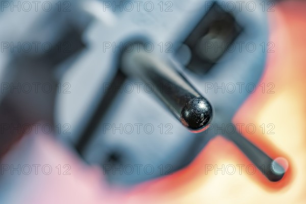 Close-up of a power plug, Schuko plug, with focus on the contact pins, symbol image for, electricity, electrical energy, power consumption, studio shot, Germany
