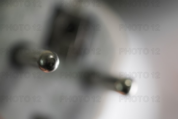 Close-up of a power plug, Schuko plug, with focus on the contact pins, symbol image for, electricity, electrical energy, power consumption, studio shot, Germany