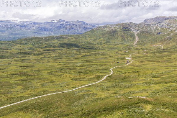 Gravel road through Jotunheimen National Park, view from Smørkollen mountain, Beitostølen, Innlandet, Norway