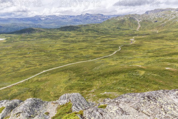 Gravel road through Jotunheimen National Park, view from Smørkollen mountain, Beitostølen, Innlandet, Norway