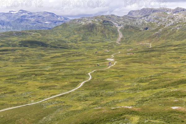 Gravel road through Jotunheimen National Park, view from Smørkollen mountain, Beitostølen, Innlandet, Norway
