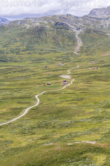 Gravel road through Jotunheimen National Park, view from Smørkollen mountain, Beitostølen, Innlandet, Norway