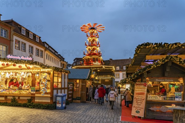Christmas pyramid at the Paderborn Christmas market at dusk, Paderborn, North Rhine-Westphalia, Germany