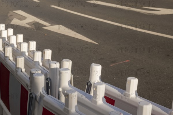 Borken, NRW, Germany, White and red plastic roadblock barriers are protecting road works, ensuring safety for drivers and workers