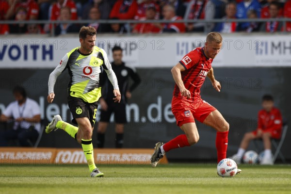 Football, Bundesliga 1, Matchday 3, 2025/2026, 1. FC Heidenheim vs. Borussia Dortmund, 13.09.2025, Voith-Arena, Heidenheim, Germany, Pascal GROSS Borussia Dortmund 13 left in duel with Adrian BECK 1. FC Heidenheim 21