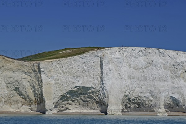 White cliff landscape with blue sky and calm sea, Old Harrys Rock, Beachy Head Lighthouse, Bournemouth, Dorset, England, Great Britain