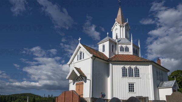 White church building with tiled roofs, Tangen kirke or church, Olavsweg or Olavsleden, pilgrimage route, Tangen, Stange municipality, Norway