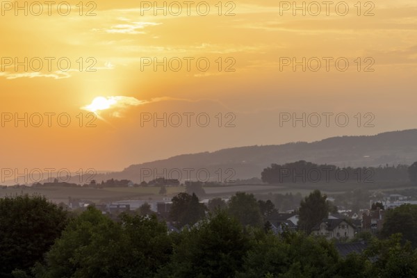 Sunset at the village of Erlen, behind Ottenberg near Weinfelden, Thurgau, Switzerland