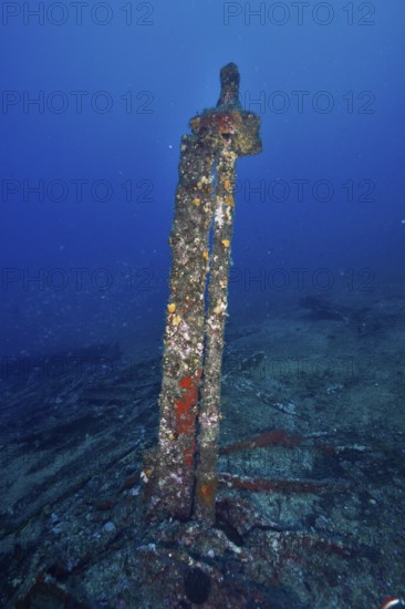 Old rusty part of a shipwreck standing on the seabed, surrounded by blue waters. Dive site wreck Le Vapeur, Giens peninsula, Provence Alpes Côte d'Azur, France