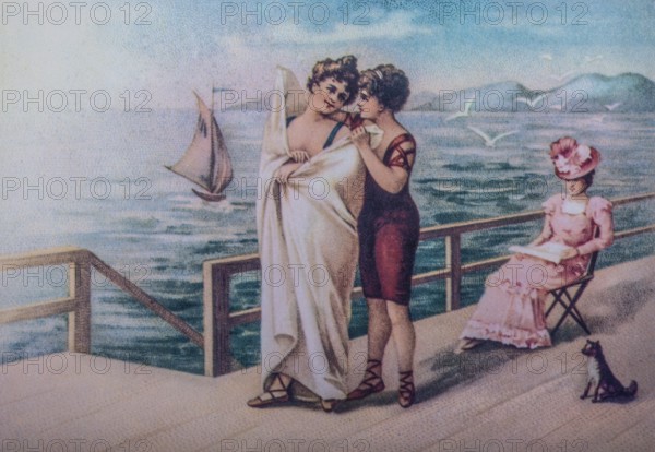 Old postcard. Women on the bathing jetty