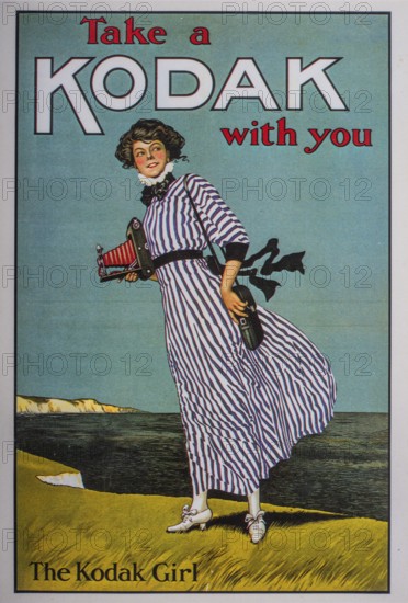 Old postcard. Woman advertising historic Kodak camera