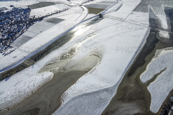 Aerial view, frozen Rhine meadow Ehingen, Mündelheim, Duisburg, Ruhr area, North Rhine-Westphalia, Germany, DE, ice surface, ice landscape, Europe, shapes and colours, aerial view, aerial photography, aerial photography, snow, overview, bird's eye view, winter, birds-eyes view, frozen Rhine meadows, cleared roads, overview