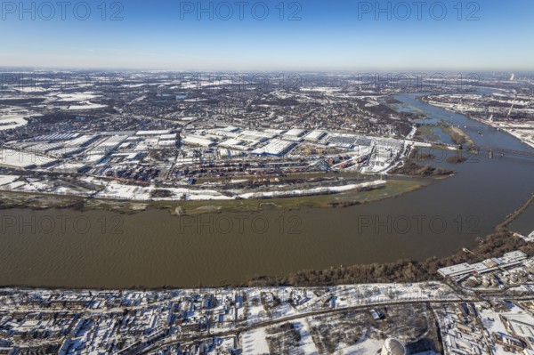 Aerial view, river Ruhr, logport I, terminal, container harbour, DIT Duisburg Intermodal Terminal GmbH, D3T Duisburg Trimodal Terminal, Wanheim-Angerhausen, Duisburg, Ruhr area, North Rhine-Westphalia, Germany, container, container terminal, container service, DE, Port of Duisburg, Duisport, Europe, distant view, river Rhine, freight traffic, port, port area, logistics, logistics centre, aerial view, aerial photography, aerial photography, snow, transport, transport service, overview, bird's-eye view, winter, birds-eyes view, cleared roads, overview
