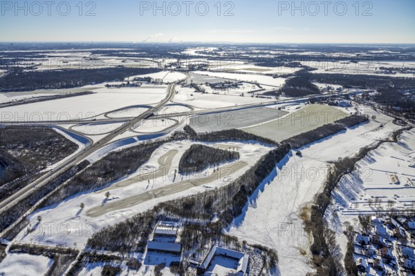 Aerial view, motorway junction Duisburg-Süd, A59 and A524, Huckingen, Duisburg, Ruhr area, North Rhine-Westphalia, Germany, motorway, DE, Europe, aerial view, aerial photography, aerial photography, snow, overview, bird's eye view, winter, birds-eyes view, cleared roads, overview