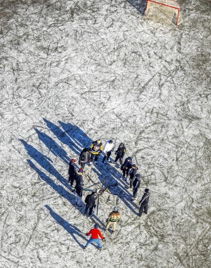 Aerial view, frozen Rhine meadow Ehingen, ice hockey players, Mündelheim, Duisburg, Ruhr area, North Rhine-Westphalia, Germany, DE, ice surface, Europe, leisure, hobby, aerial photography, aerial photography, aerial photography, snow, sports, overview, bird's eye view, winter, birds-eyes view, frozen Rhine meadows, cleared roads, overview