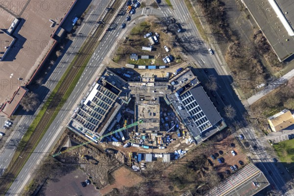 Aerial view, construction site for planned office building, former Hamborn municipal swimming pool, corner Duisburger Straße, Walther-Rathenau-Straße, Obermarxloh, Duisburg, Ruhr area, North Rhine-Westphalia, Germany, construction work, construction, construction area, construction site, building plots, construction crane, construction project, construction site, DE, Europe, aerial view, aerial photography, aerial photography, new building, municipal swimming pool, overview, bird's eye view, birds-eyes view, overview