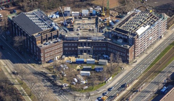 Aerial view, construction site for planned office building, former Hamborn municipal swimming pool, corner Duisburger Straße, Walther-Rathenau-Straße, Obermarxloh, Duisburg, Ruhr area, North Rhine-Westphalia, Germany, construction work, construction, construction area, construction site, building plots, construction crane, construction project, construction site, DE, Europe, aerial view, aerial photography, aerial photography, new building, municipal swimming pool, overview, bird's eye view, birds-eyes view, overview
