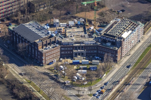 Aerial view, construction site for planned office building, former Hamborn municipal swimming pool, corner Duisburger Straße, Walther-Rathenau-Straße, Obermarxloh, Duisburg, Ruhr area, North Rhine-Westphalia, Germany, construction work, construction, construction area, construction site, building plots, construction crane, construction project, construction site, DE, Europe, aerial view, aerial photography, aerial photography, new building, municipal swimming pool, overview, bird's eye view, birds-eyes view, overview