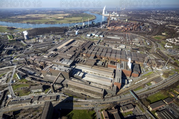 Aerial view, thyssenkrupp Steel Europe, river Rhine, Marxloh, Duisburg, Ruhr area, North Rhine-Westphalia, Germany, DE, Europe, commercial enterprises, commercial area, commercial park, commercial location, commercial use, industrial area, industrial building, industrial location, aerial photograph, aerial photography, aerial photography, overview, bird's-eye view, overview