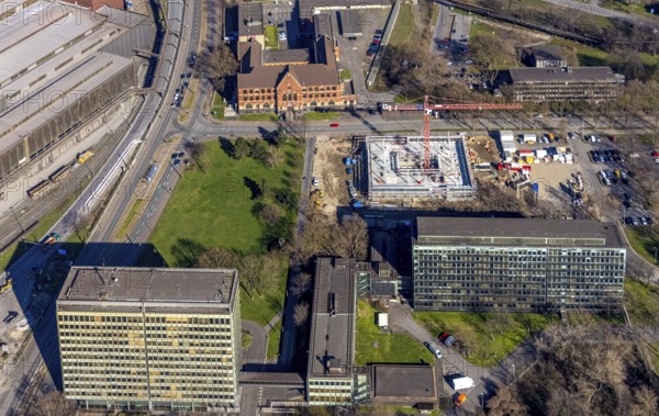 Aerial view, construction site new building on the administration site thyssenkrupp Steel Europe AG, Bruckhausen, Duisburg, Ruhr area, North Rhine-Westphalia, Germany, construction work, construction, construction area, construction site, building plots, construction crane, construction project, construction site, DE, Europe, Franz-Lenze-Straße, aerial view, aerial photography, aerial photography, new building, overview, bird's-eye view, bird's-eye view, overview