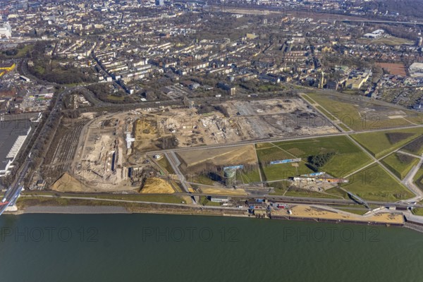 Aerial view, demolition of wire rolling mill for new construction RHEINORT neighbourhood, construction area at Rheinpark Duisburg, water tower Hochfeld, river Rhine, Hochfeld, Duisburg, Ruhr area, North Rhine-Westphalia, Germany, construction work, construction, construction area, construction site, construction project, construction site, DE, Europe, aerial view, aerial photography, aerial photography, new construction, park, overview, bird's-eye view, overview