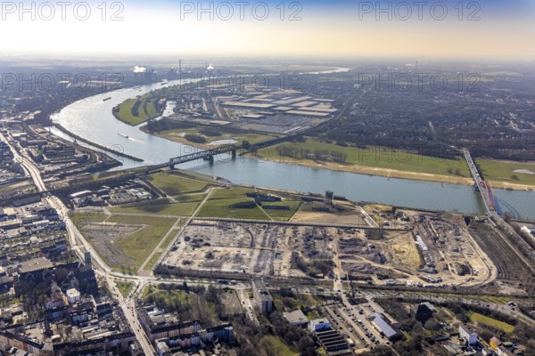 Aerial view, demolition of wire rolling mill for new construction RHEINORT neighbourhood, construction area at Rheinpark Duisburg, water tower Hochfeld, river Rhine, Hochfeld, Duisburg, Ruhr area, North Rhine-Westphalia, Germany, construction work, construction, construction area, construction site, construction project, construction site, DE, Europe, aerial view, aerial photography, aerial photography, new construction, park, overview, bird's-eye view, overview