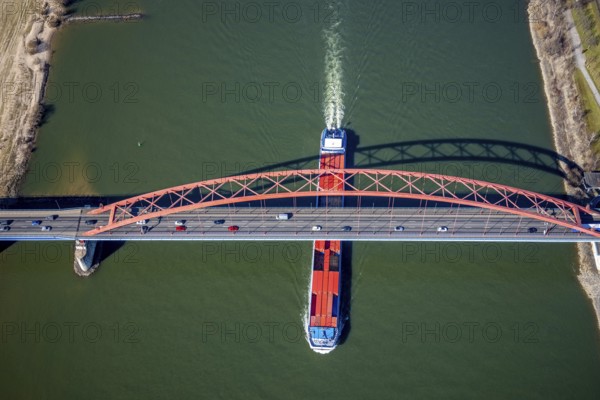 Aerial view, Bridge of Solidarity and container ship on the Rhine, Hochfeld, Duisburg, Ruhr area, North Rhine-Westphalia, Germany, inland navigation, container ships, DE, Europe, freight transport, freight traffic, logistics, aerial view, aerial photography, aerial photography, mortar road, shipping, shipping traffic, overview, bird's-eye view, overview