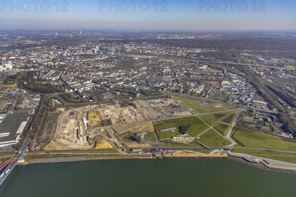 Aerial view, demolition of wire rolling mill for new construction RHEINORT neighbourhood, construction area at Rheinpark Duisburg, water tower Hochfeld, river Rhine, Hochfeld, Duisburg, Ruhr area, North Rhine-Westphalia, Germany, construction work, construction, construction area, construction site, construction project, construction site, DE, Europe, aerial view, aerial photography, aerial photography, new construction, park, overview, bird's-eye view, overview
