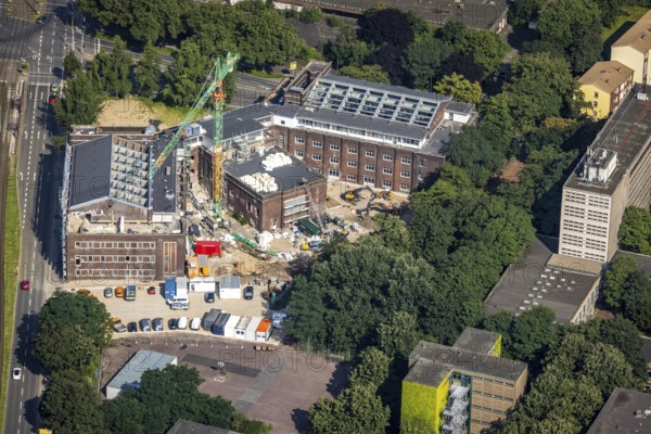 Aerial view, construction site for planned office building, former municipal swimming pool Hamborn, Duisburger Straße corner Walther-Rathenau-Straße, Obermarxloh, Duisburg, Ruhr area, North Rhine-Westphalia, Germany, construction work, construction area, construction site, building plots, construction project, construction site, DE, Europe, aerial view, aerial photography, aerial photography, new building, overview, bird's-eye view, birds-eyes view, overview