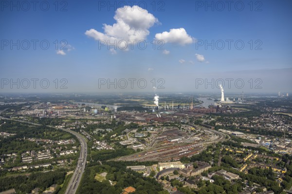Aerial view, goods train station, thyssenkrupp Steel Europe factory premises, river Rhine with STEAG cogeneration plant Walsum, Marxloh, Duisburg, Ruhr area, North Rhine-Westphalia, Germany, DE, Europe, commercial enterprises, commercial area, commercial park, commercial site, commercial use, greenhouse, industrial area, industrial building, industrial site, power plant, aerial view, aerial photography, aerial photography, aerial photography, overview, bird's-eye view, birds-eyes view, overview