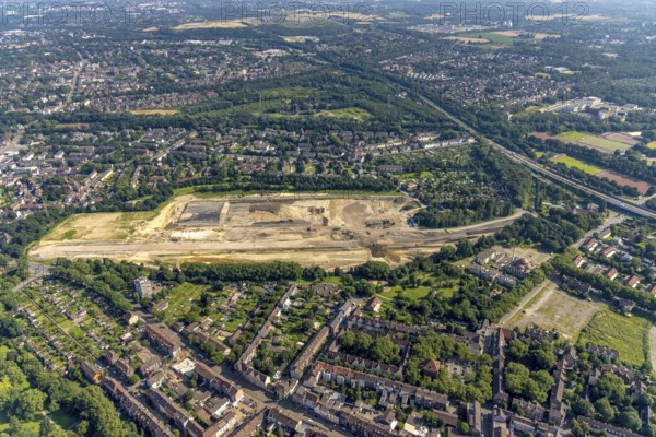 Aerial view, brownfield revitalisation commercial area Friedrich-Park, planned thoroughfare, DITIB Merkez Mosque, Marxloh, Duisburg, Ruhr area, North Rhine-Westphalia, Germany, place of worship, construction work, construction area, building site, building plots, construction project, DE, Europe, commercial enterprises, commercial area, commercial area, commercial park, commercial site, commercial use, religious community, place of worship, holy place, industrial area, industrial site, church, parish, denomination, aerial view, aerial photography, aerial photography, new building, religion, religious site, overview, bird's-eye view, overview