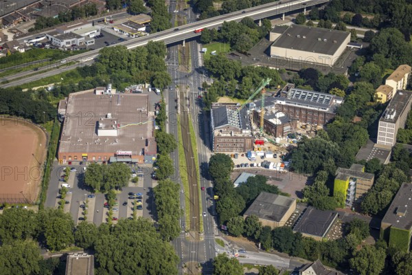 Aerial view, construction site for planned office building, former municipal swimming pool Hamborn, Duisburger Straße corner Walther-Rathenau-Straße, Obermarxloh, Duisburg, Ruhr area, North Rhine-Westphalia, Germany, construction work, construction area, construction site, building plots, construction project, construction site, DE, Europe, aerial view, aerial photography, aerial photography, new building, overview, bird's-eye view, birds-eyes view, overview