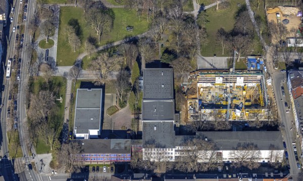 Aerial view, construction site, new building, sports hall Steinbart-Gymnasium, Dellviertel, Duisburg, Ruhr area, North Rhine-Westphalia, Germany, construction work, construction, construction area, building site, building plots, construction measure, construction project, construction site, education, educational institution, DE, Europe, grammar school, teaching institute, aerial view, aerial photography, aerial photography, new building, Realschulstraße, school, overview, bird's eye view, overview