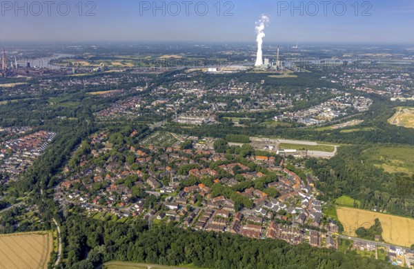Aerial view, view of Wehofen with STEAG cogeneration plant Walsum, development and new warehouses logport VI, river Rhine, district Wehofen, Duisburg, Ruhr area, North Rhine-Westphalia, Germany, construction work, construction area, building site, building plots, construction measure, construction project, construction site, DE, vapour cloud, development, Europe, commercial area, commercial area, commercial use, property tax, thermal power station, real estate, industrial facilities, industrial area, industrial site, capacity requirements, aerial view, aerial photography, aerial photography, new build, smoke cloud, overview, bird's-eye view, housing estate, housing and living, residential area, residential buildings, housing quality, residential neighbourhood, housing estate, birds-eyes view, former Walsum colliery, logport VI, overview