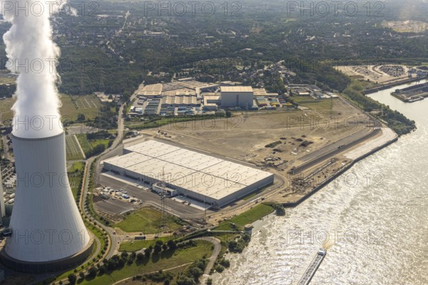 Aerial view, STEAG Walsum CHP plant, development and new warehouses logport VI, river Rhine, Alt-Walsum, Duisburg, Ruhr area, North Rhine-Westphalia, Germany, construction work, construction area, construction site, building plots, construction project, construction site, DE, vapour cloud, development, Europe, commercial area, commercial area, commercial use, cogeneration plant, industrial plant, industrial area, industrial site, capacity requirements, aerial view, aerial photography, aerial photography, new construction, smoke cloud, overview, bird's-eye view, birds-eyes view, former Walsum colliery, logport VI, overview