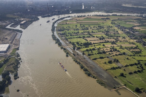 Aerial view, flood river Rhine at logport VI, ferry pier Rhine ferry Walsum, south harbour Walsum, container ships, Qalsum, Orsoy, Rheinberg, Ruhr area, North Rhine-Westphalia, Germany, DE, Duisburg, Europe, flood, flood of the century, aerial view, aerial photography, aerial photography, water level Duisburg, Rhine floodplain, Rhine flood, shipping traffic, heavy rain, overview, bird's eye view, bird's eye view, logport 6, logport VI, overview, flooding