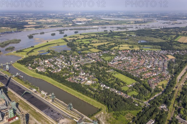 Aerial view, flood river Rhine, flooding Rheinaue Walsum, Nordhafen Walsum, Alt-Walsum, Duisburg, Ruhr area, North Rhine-Westphalia, Germany, DE, Europe, flood, flood of the century, landscape conservation area, aerial photograph, aerial photography, aerial photography, nature reserve, water level Duisburg, Rhine flood, heavy rain, overview, bird's eye view, bird's eye view, overview, flooding