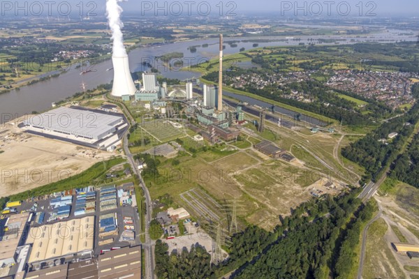 Aerial view, STEAG cogeneration plant Walsum, development and new warehouses logport VI, river Rhine, Alt-Walsum, Duisburg, Ruhr area, North Rhine-Westphalia, Germany, construction work, construction area, construction site, building plots, construction project, construction site, DE, development, Europe, industrial area, commercial area, commercial use, cogeneration plant, industrial facilities, industrial area, industrial site, capacity requirements, aerial view, aerial photography, aerial photography, new construction, overview, bird's-eye view, birds-eyes view, former Walsum colliery, logport VI, overview