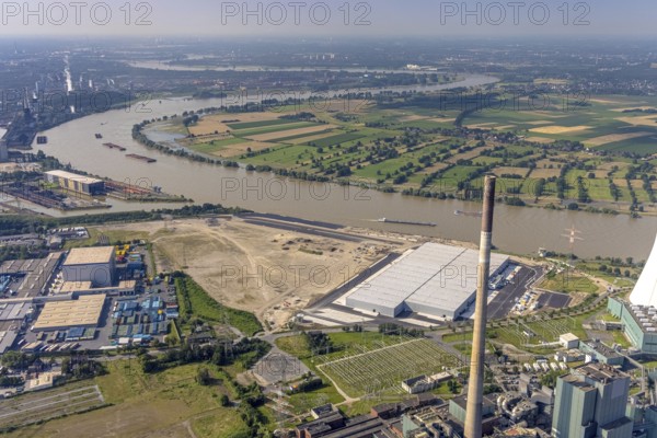Aerial view, STEAG cogeneration plant Walsum, development and new warehouses logport VI, river Rhine, Alt-Walsum, Duisburg, Ruhr area, North Rhine-Westphalia, Germany, construction work, construction area, construction site, building plots, construction project, construction site, DE, development, Europe, industrial area, commercial area, commercial use, cogeneration plant, industrial facilities, industrial area, industrial site, capacity requirements, aerial view, aerial photography, aerial photography, new construction, overview, bird's-eye view, birds-eyes view, former Walsum colliery, logport VI, overview