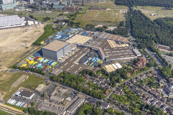 Aerial view, STEAG cogeneration plant Walsum, development and new warehouses logport VI, river Rhine, Alt-Walsum, Duisburg, Ruhr area, North Rhine-Westphalia, Germany, construction work, construction area, construction site, building plots, construction project, construction site, DE, development, Europe, industrial area, commercial area, commercial use, cogeneration plant, industrial facilities, industrial area, industrial site, capacity requirements, aerial view, aerial photography, aerial photography, new construction, overview, bird's-eye view, birds-eyes view, former Walsum colliery, logport VI, overview