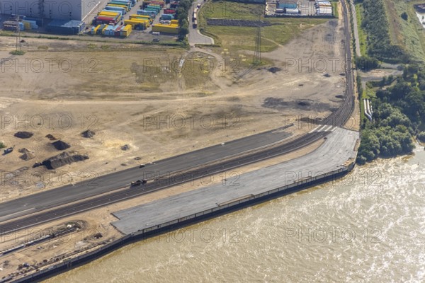 Aerial view, STEAG cogeneration plant Walsum, development and new warehouses logport VI, river Rhine, Alt-Walsum, Duisburg, Ruhr area, North Rhine-Westphalia, Germany, construction work, construction area, construction site, building plots, construction project, construction site, DE, development, Europe, industrial area, commercial area, commercial use, cogeneration plant, industrial facilities, industrial area, industrial site, capacity requirements, aerial view, aerial photography, aerial photography, new construction, overview, bird's-eye view, birds-eyes view, former Walsum colliery, logport VI, overview