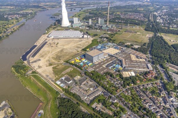 Aerial view, STEAG cogeneration plant Walsum, development and new warehouses logport VI, river Rhine, Alt-Walsum, Duisburg, Ruhr area, North Rhine-Westphalia, Germany, construction work, construction area, construction site, building plots, construction project, construction site, DE, development, Europe, industrial area, commercial area, commercial use, cogeneration plant, industrial facilities, industrial area, industrial site, capacity requirements, aerial view, aerial photography, aerial photography, new construction, overview, bird's-eye view, birds-eyes view, former Walsum colliery, logport VI, overview