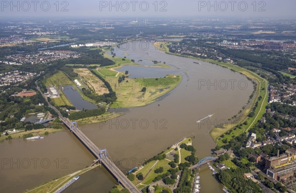 Aerial photograph, flood river Rhine, Rhine meadows near Duisburg Homberg, Ruhr estuary into the Rhine, Friedrich-Ebert-Bridge, Ruhrort, Duisburg, Ruhr area, North Rhine-Westphalia, Germany, bridge, DE, Europe, flood, flood of the century, aerial photograph, aerial photography, aerial photography, water level Duisburg, Rhine floodplain, Rhine flood, shipping traffic, heavy rain, overview, bird's eye view, birds-eyes view, overview, flooding